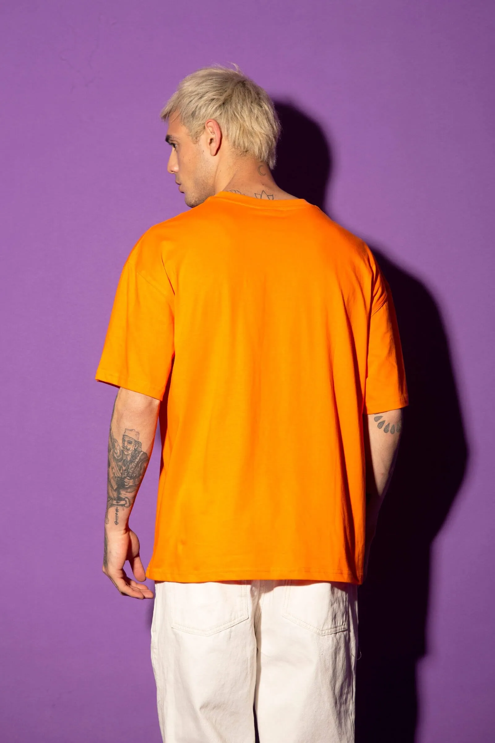 Stylish Orange Wingman Oversized Graphic T-Shirt for Ultimate Comfort and Trendy Fashion